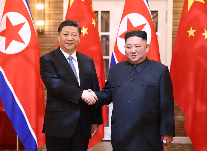 習近平同朝鮮勞動黨委員長、國務委員會委員長金正恩舉行會談